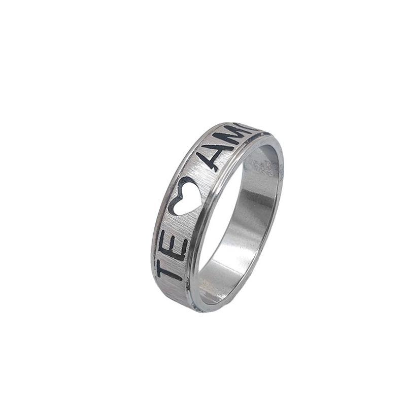 ANEL AÇO ALIANÇA ANATÔMICA RETA ESCOVADA 6MM C/ MANUSCRITO EU TE AMO VAZADO - Número 32/33
