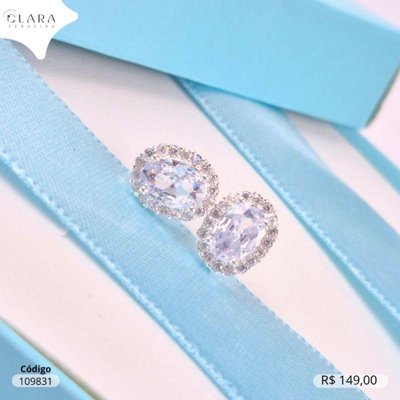 BRINCO PRATA 925 ZIRCÔNIA OVAL CRISTAL 6MM ADORNADA C/ 1 FILEIRA DE MICROZIRCÔNIAS - 10MM