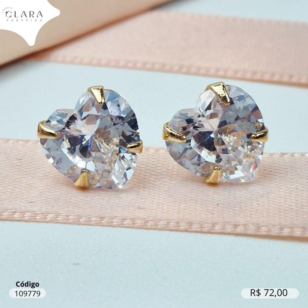 BRINCO SOLITARIO ZIRCONIA CORAÇÃO 10MM BASE 4 GARRAS CAIXA BAIXA - Dourado