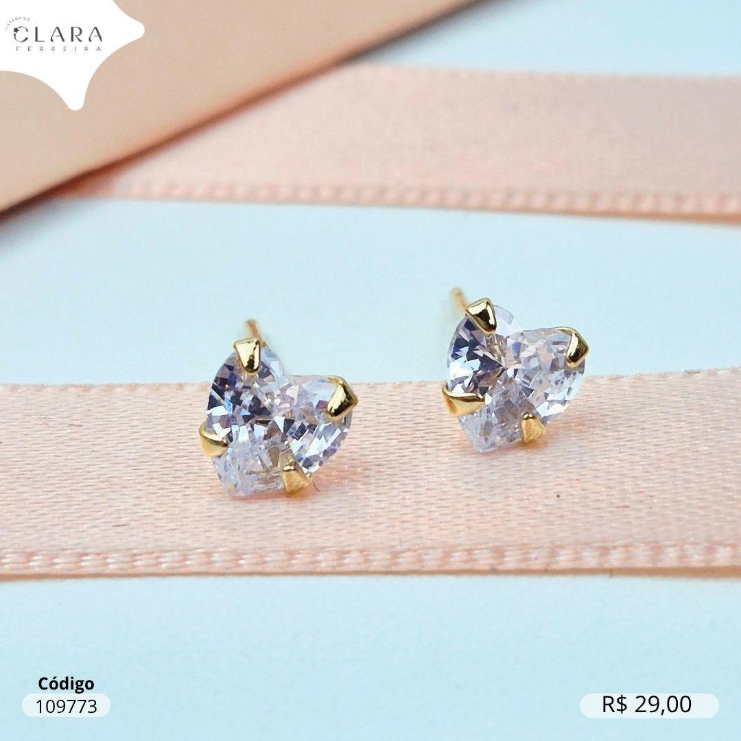 BRINCO SOLITARIO ZIRCONIA CORAÇÃO 5MM BASE 4 GARRAS CAIXA BAIXA - Dourado