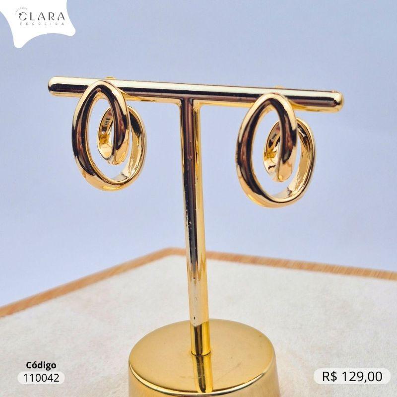 BRINCO GOTA LISA TORCIDA FORMATO CORAÇÃO - LINHA ORGÂNICOS - 23MM - Dourado