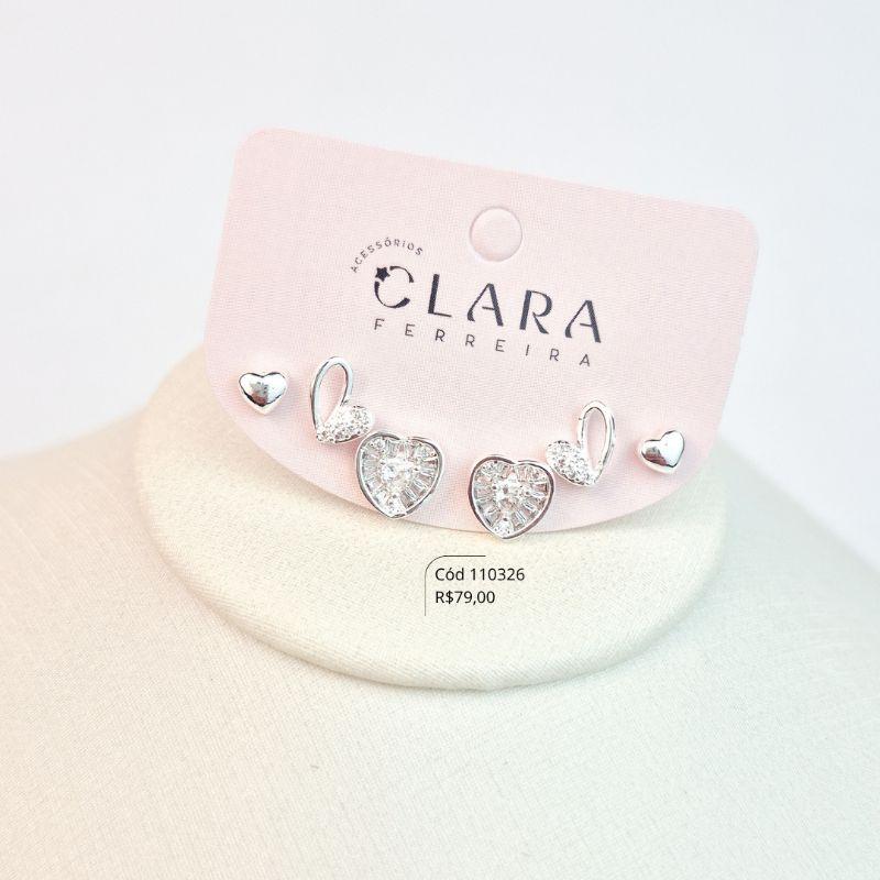 BRINCO KIT TRIO CORAÇÕES MISTOS: 1 CORAÇÃO ZIRCONIAS TRAPEZIO 8MM, 1 CORAÇÃO 1 LADO MICROZIRCÔNIAS E 1 LADO FIO LISO VAZADO 6MM E 1 CORAÇÃO LISO 4MM - Banho de Prata - PEÇA LIMITADA