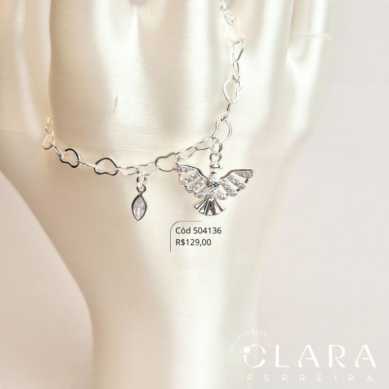 PULSEIRA ELOS CORAÇÕES ENTRELAÇADOS C/ PINGETE ESPIRITO SANTOVAZADO COM ASAS MICROZIRCÔNIAS 14MM E 1 TIFFANY GOTA 5MM PENDURADOS - 17CM - Banho de Prata - LIMITADA
