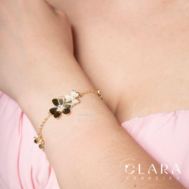 PULSEIRA ELOS C/ 5 FLORES: 3 LISAS COM MIOLO DE ZIRCÔNIA REDONDA E 2 COM MICROZIRCÔNIAS, COM MIOLO DE ZIRCÔNIA - 10 E 15MM - 17CM - Dourado