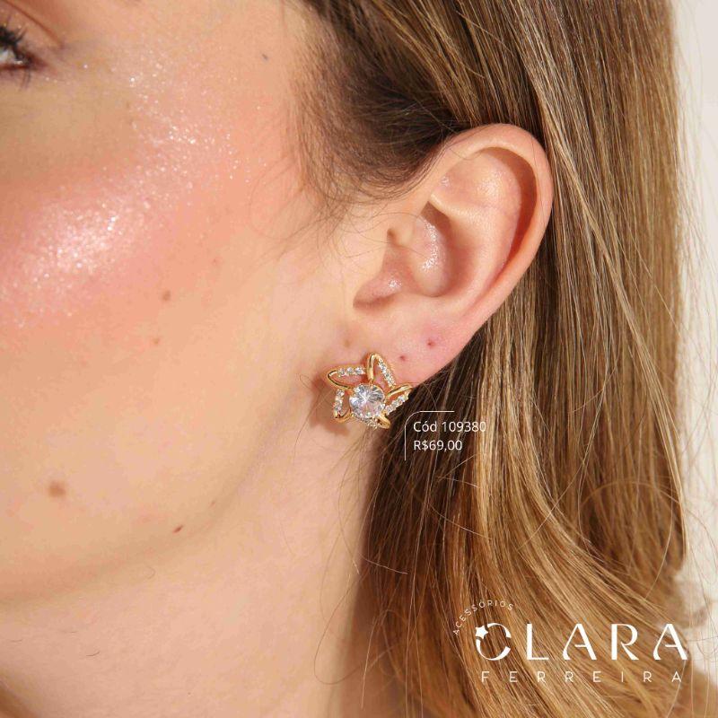 BRINCO ESTRELA MICROZIRCONIAS VAZADA C/ ZIRCONIA REDONDA 6MM NO MEIO - 16MM - Dourado