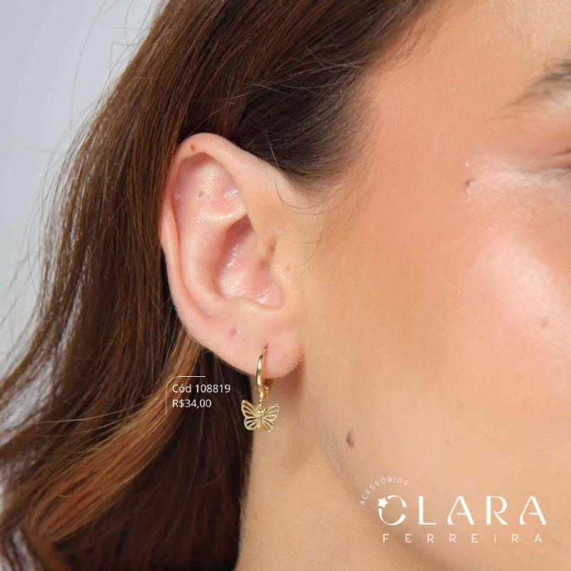 BRINCO ARGOLINHA TRANQUETA C/ BORBOLETA LISA VAZADA PENDURADA  - 7MM - Dourado