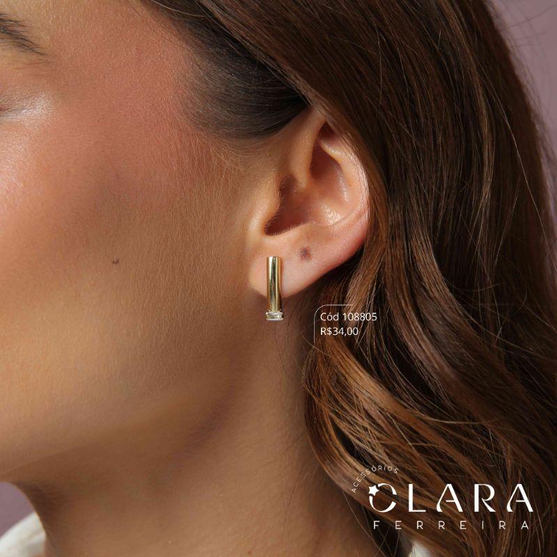BRINCO TUBO C/ 1 ZIRCONIA BAGUETE 4MM NA PONTA - 28MM - Dourado