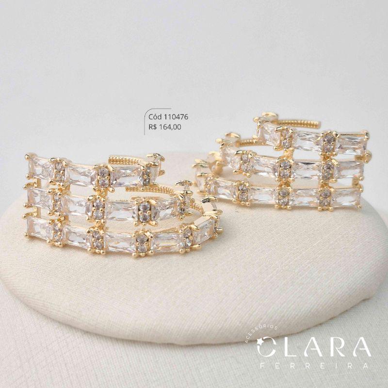 BRINCO MAX SILHUETA 3 FILEIRAS ZIRCÔNIAS BAGUETE VAZADAS - EDIÇÃO LIMITADA - 31MM - Dourado