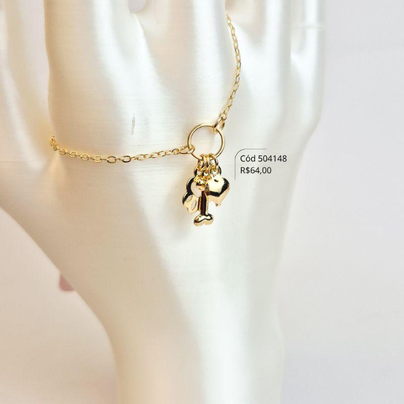 PULSEIRA ELOS C/ PATUA 1 PATINHA VAZADA,1 OSSO E 1 CORAÇÃO PENDURADOS  - 17CM - Dourado - LIMITADA