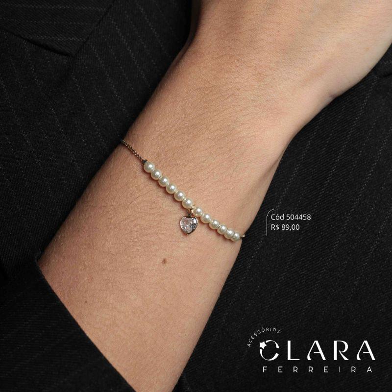 PULSEIRA AJUSTÁVEL VENEZIANA C/ MEIO PÉROLAS E 1 TIFF ZIRCONIA CORAÇÃO 7MM PENDURADA - Dourado