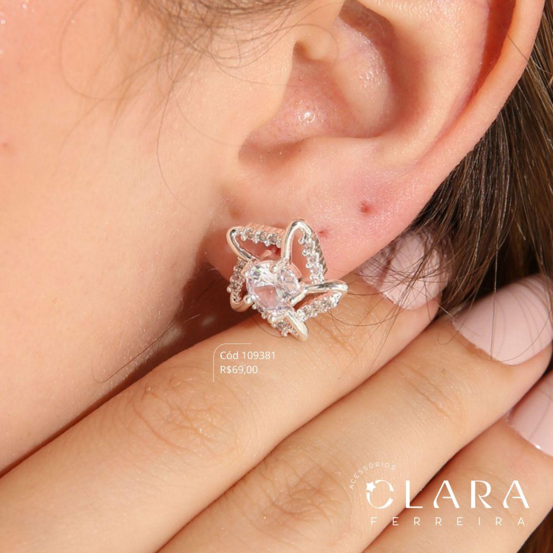 BRINCO ESTRELA MICROZIRCONIAS VAZADA C/ ZIRCONIA REDONDA 6MM NO MEIO - 16MM - Banho de Prata