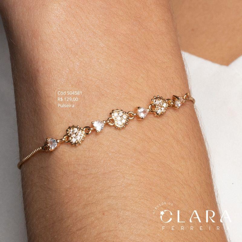 PULSEIRA AJUSTÁVEL VENEZIANA C/ MEIO 3 CORAÇÕES MICROZIRCÔNIAS E 4 ZIRCÔNIAS CORAÇÕES 3MM CAIXA COROA 3 GARRAS - Dourado