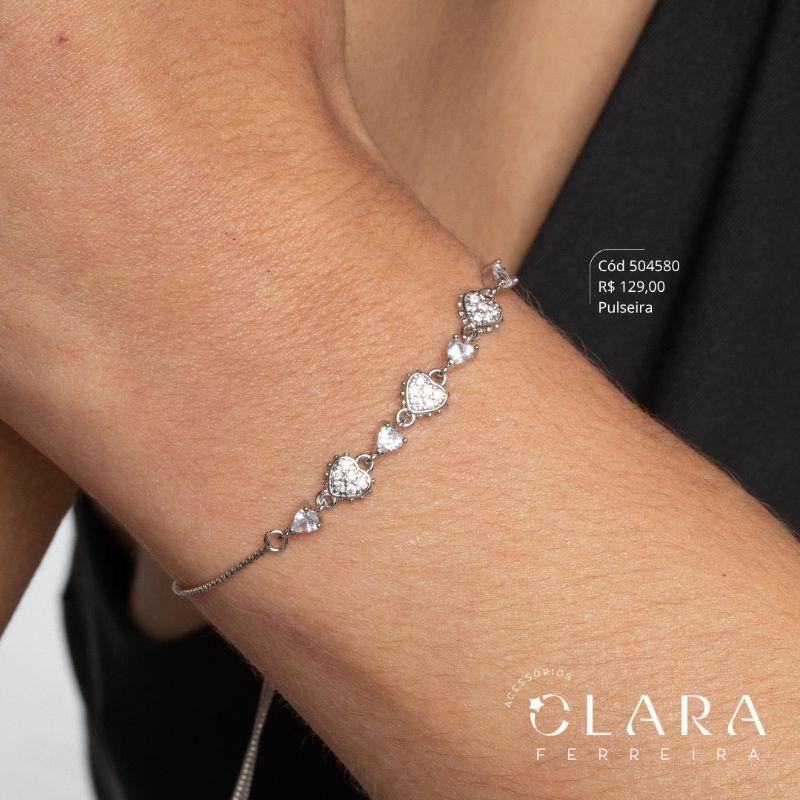 PULSEIRA AJUSTÁVEL VENEZIANA C/ MEIO 3 CORAÇÕES MICROZIRCÔNIAS E 4 ZIRCÔNIAS CORAÇÕES 3MM CAIXA COROA 3 GARRAS - Ródio Branco