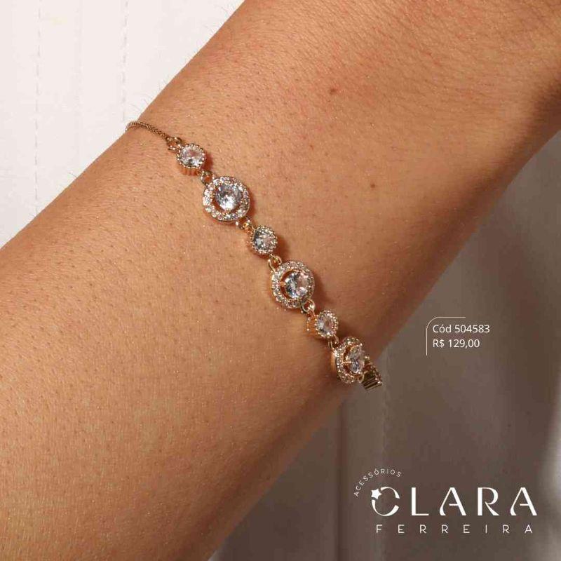 PULSEIRA AJUSTÁVEL VENEZIANA C/ MEIO 3 ZIRCÔNIAS REDONDA ADORNADAS MICROZIRCÔNIAS E 4 ZIRCÔNIAS REDONDAS 3MM CAIXA INGLESA FUNDIDA - Dourado