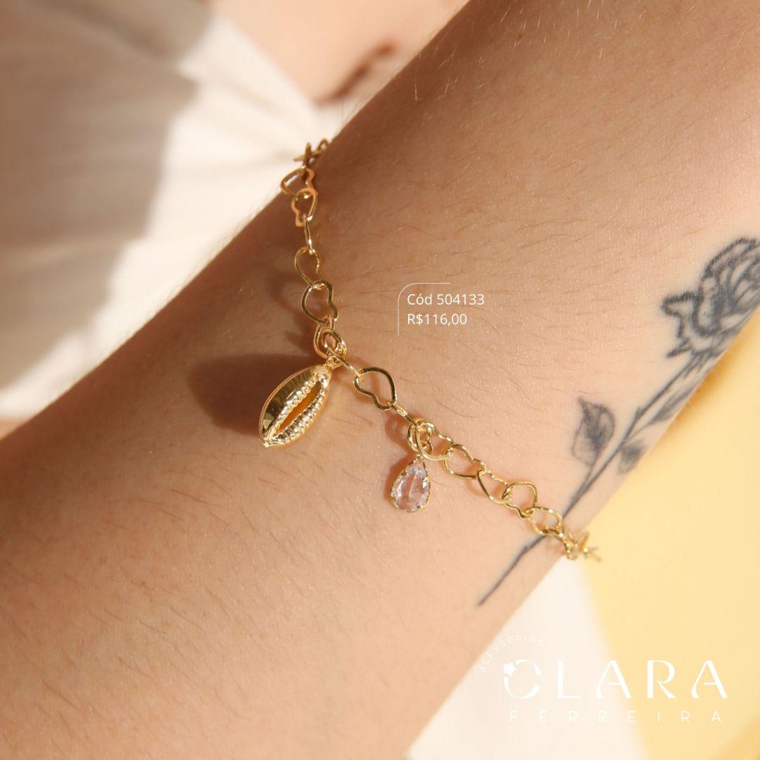 PULSEIRA ELOS CORAÇÕES ENTRELAÇADOS C/ PINGETE BUSIOS LISO 11MM E 1 TIFFANY GOTA 5MM PENDURADOS - 17CM - Dourado
