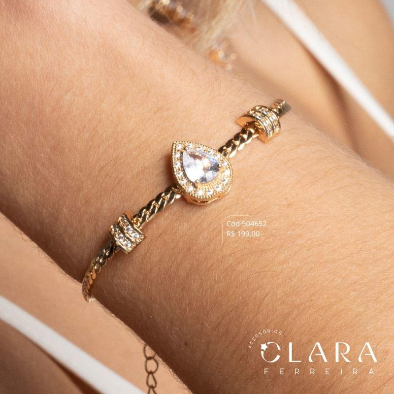 PULSEIRA MALHA TRANÇADA E MARTELADA 4MM C/ 1 ZIRCÔNIA GOTA 9MM ADORNADA MICROZIRCÔNIAS E 2 BARRINHAS MICROZIRCÔNIAS 8MM FIXAS - 3MM - 17CM - Dourado